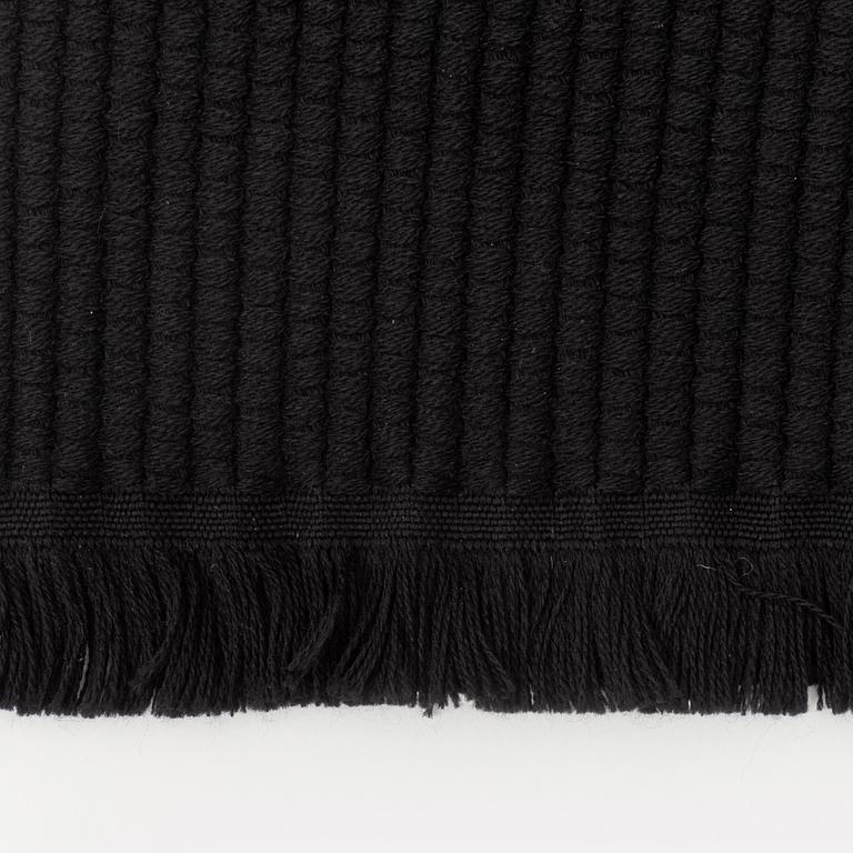 Gucci, a black wool scarf.