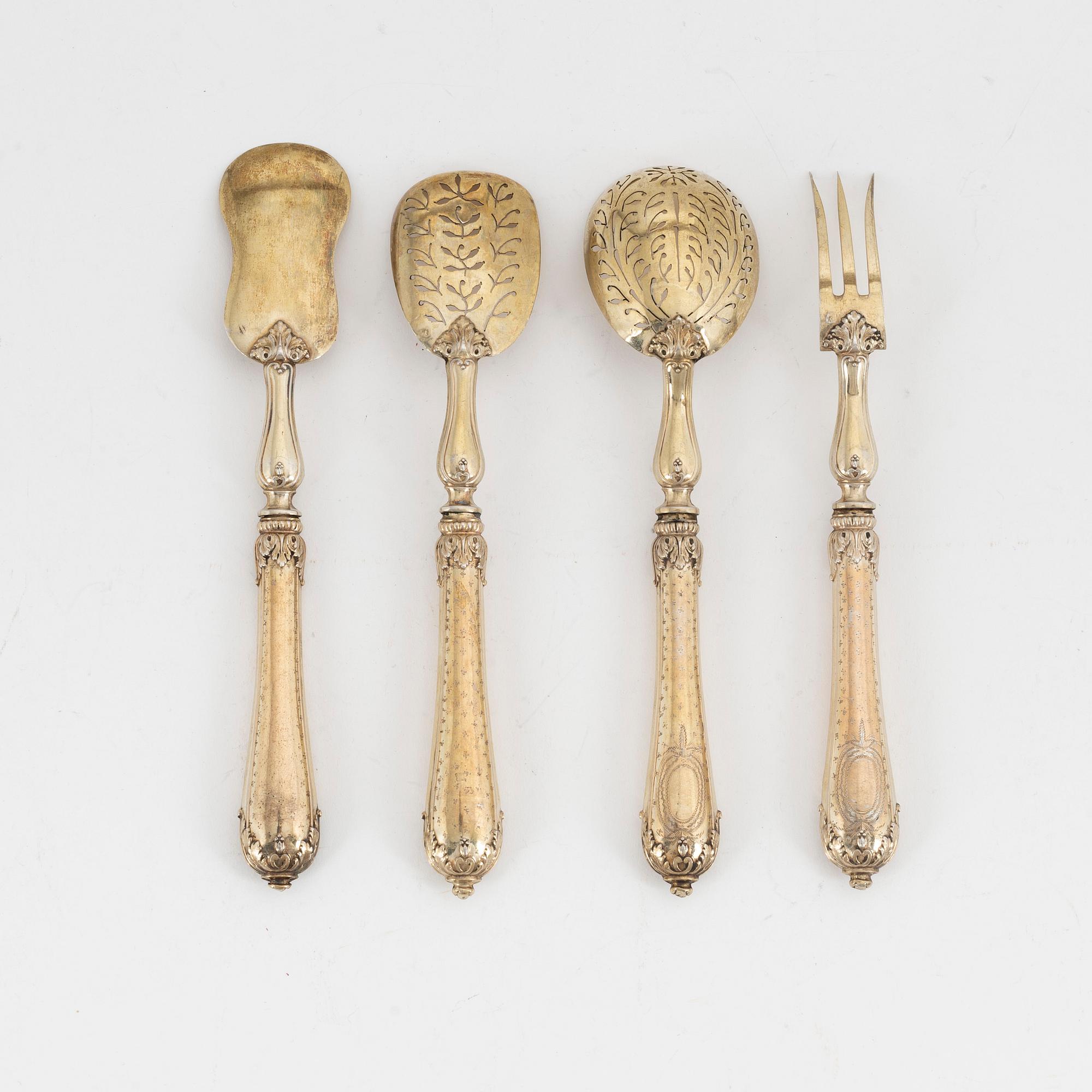 A set of four silver-gilt dessert cutlery, french export mark of Emile Huignard, late 19th century.
