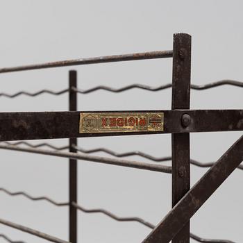 A Rigidex iron wine rack, France.