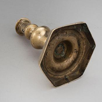 A BRONZE BAROQUE CANDLESTICK, 17th century.