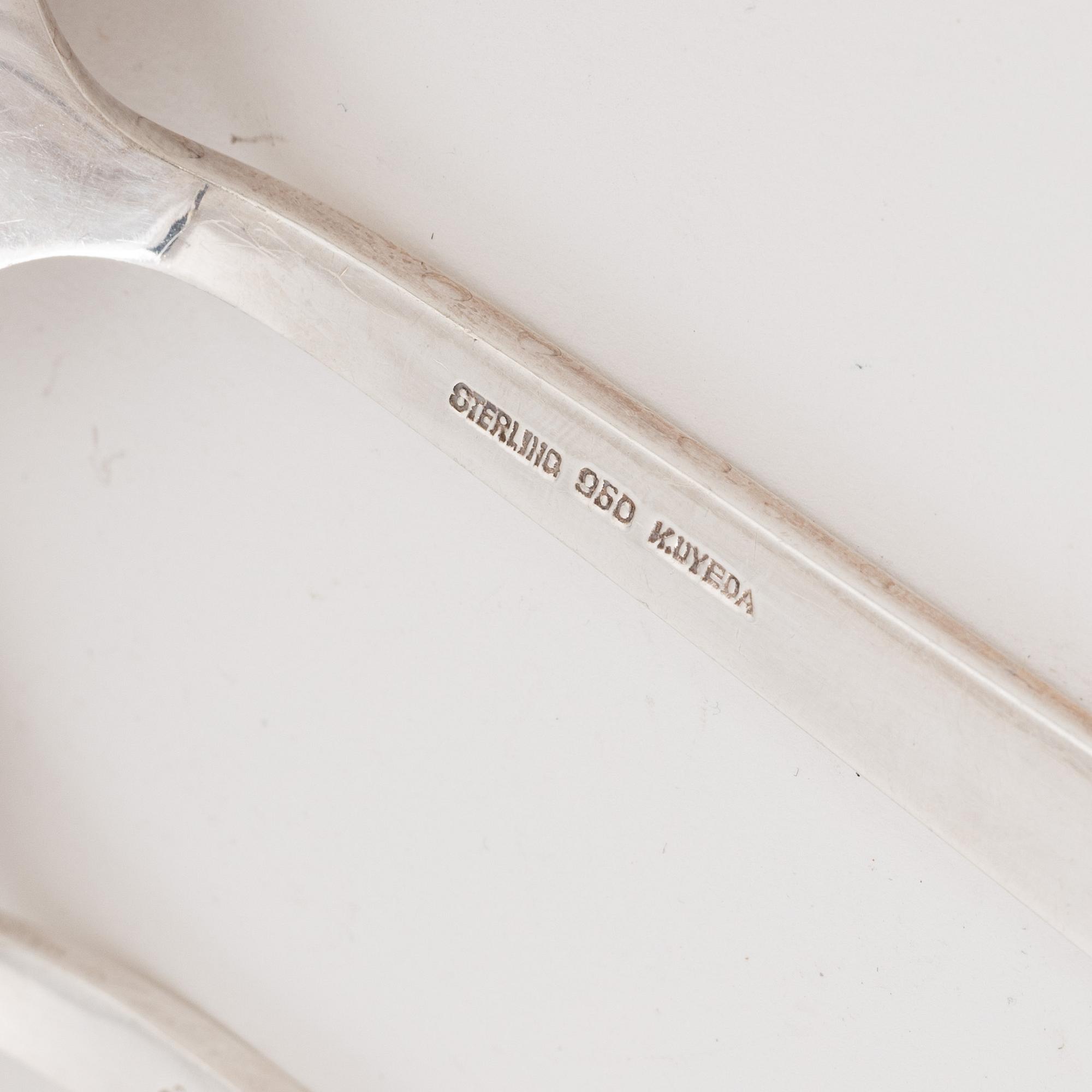 A Japanese sterling silver cutlery, mark of K. Uyeda, 20th century (98 pieces).