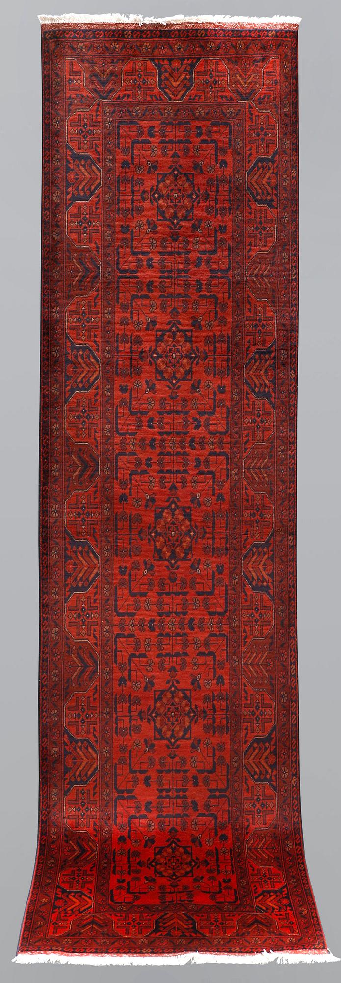 An Afghan runner, so called Khan Mohammadi, ca 297 x 78 cm.
