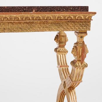 An Empire giltwood and 'Blyberg' porphyry console in the manner of J. Frisk, Stockholm early 19th century.