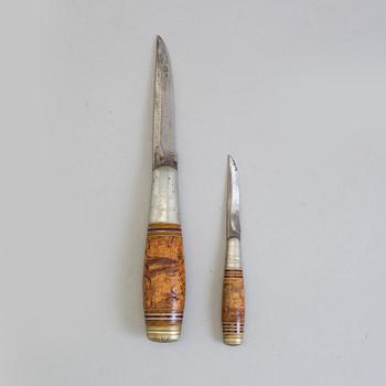 a brass and leather belt by Gustav Blomqvist 19th/20th century.