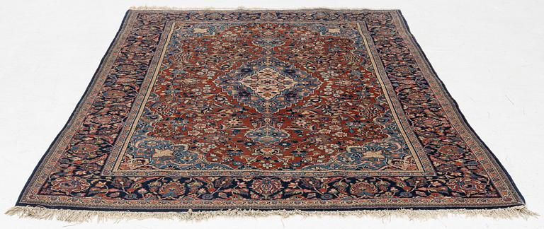 An Oriental rug, c. 195 x 132 cm.