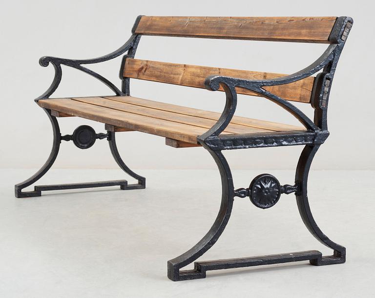 A Folke Bensow cast iron and stained wood park bench, Näfveqvarn.