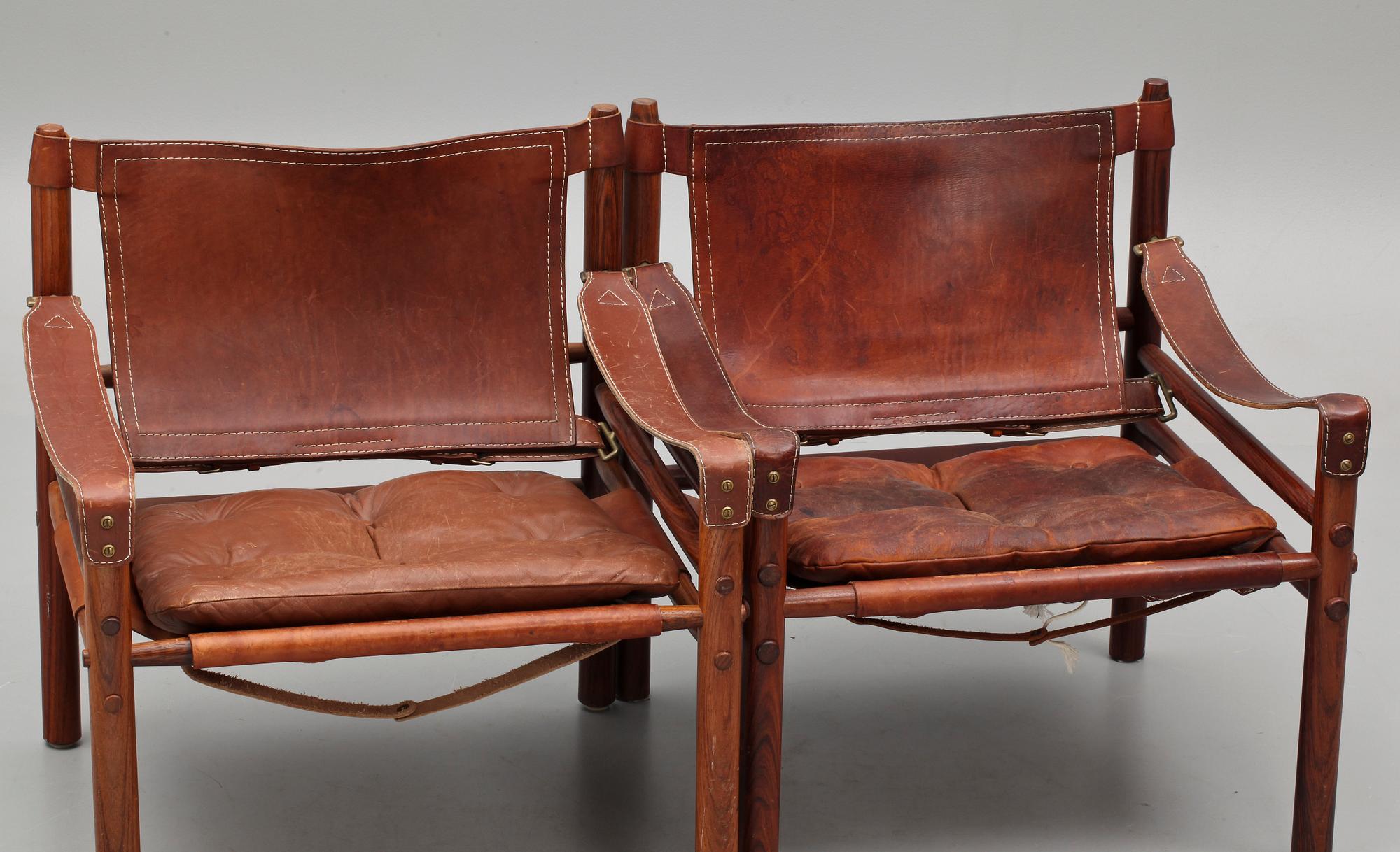 KARMSTOLAR, ett par, "Sirocco", design Arne Norell, 1900-talets tredje kvartal.
