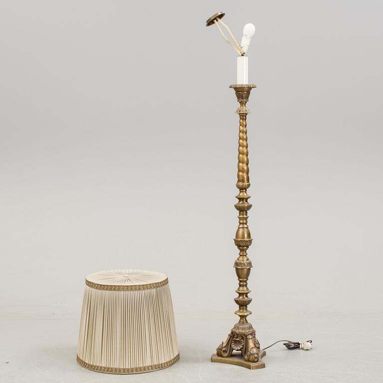 a early 20h Century brass floor lamp.