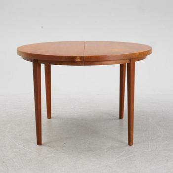 A five-piece teak and oak dining suite, second half of the 20th Century.