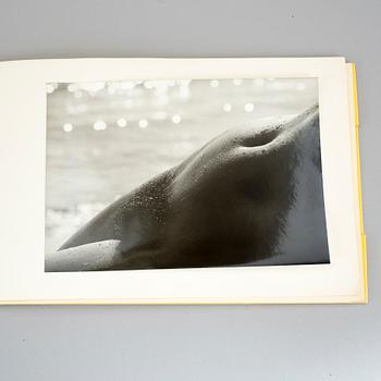 LUCIEN CLERGUE, album med 11 gelatinsilverfotografier, vintage. Numrerad 192, upplaga 250.