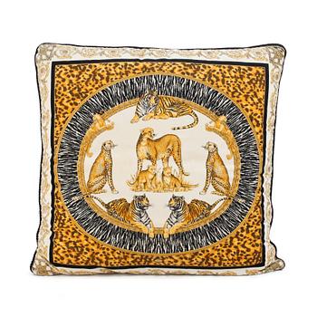 VERSACE, a velvet pillow.