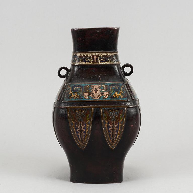 A bronze and cloisonne jar, China, circa 1900, with inscritption to base.