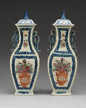 A pair of famille rose vases with covers, Qing dynasty, Qianlong (1736-95).