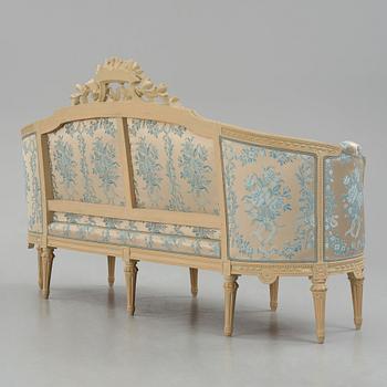 A grey-painted Gustavian 'canapé en corbeille'. sofa, later part of the 18th century.