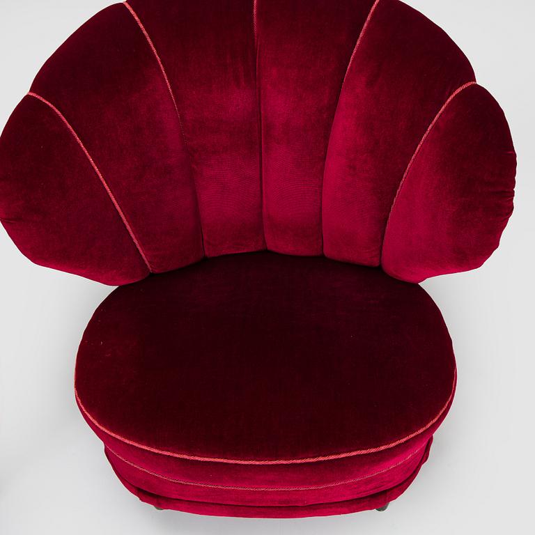 A pair of mid-20th century armchairs.
