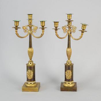 A pair of empire style candelabra, first half of the 20th century.