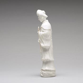 A blanc de chine figure of a lady-in-waiting, Qing dynasty, Kangxi (1662-1722).