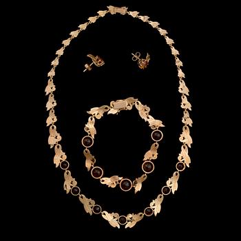 COLLIER, ARMBAND och ÖRHÄNGEN, fasettslipade citriner, 18K guld. A. Tillander, Helsingfors 1955.