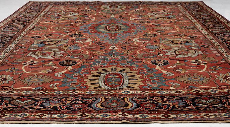 A Sultanabad carpet, west Persia c. 530 x 378 cm.