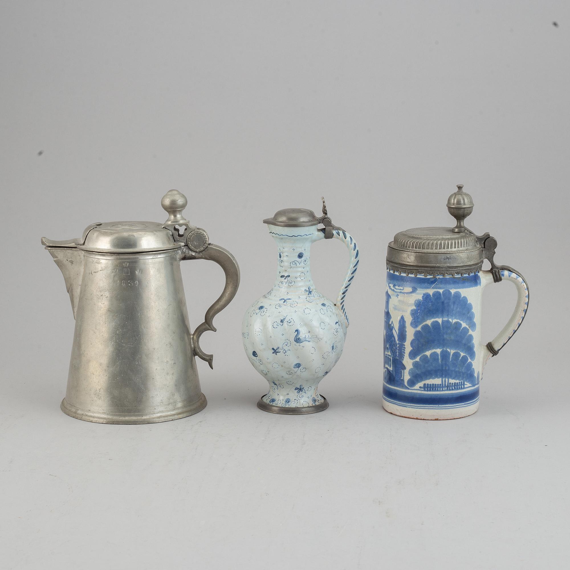 A group of three pewter and faience ewers, Holland/Germany, 18th/19th Century.