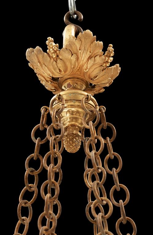 A Louis XVI-style 19th century six-light gilt bronze hanging-lamp.