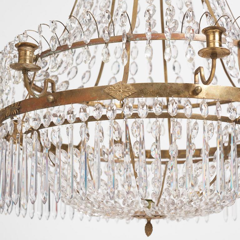 A late Gustavian nine-light gilt brass and cut glass chandelier, Stockholm, late 18th century.