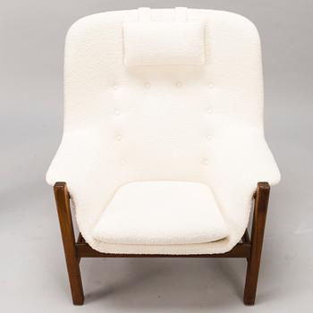 CARL GUSTAF HIORT AF ORNÄS, A 1960s 'Caravelle' armchair and ottoman for Puunveisto Oy - Wood work Ltd.