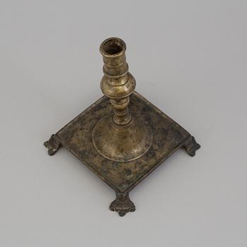 A BRONZE  CANDLESTICK, 17th century.