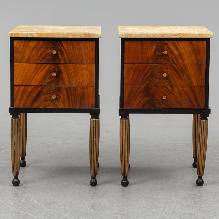 A pair of mid 20th century bedside tables.