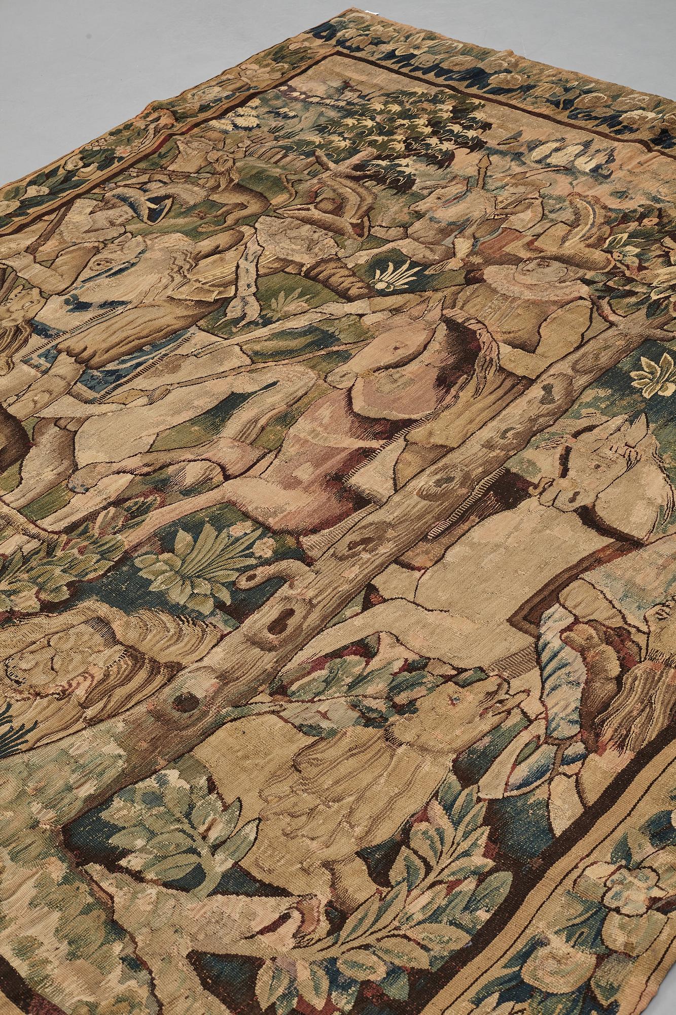 A TAPESTRY, "Lion hunting", tapestry weave, Flanders the middle of the 17th century, possibly Oudenarde, ca 262 x 249 cm.
