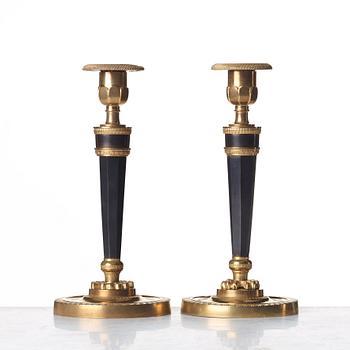 A pair of French Directoire candlesticks, circa 1800.