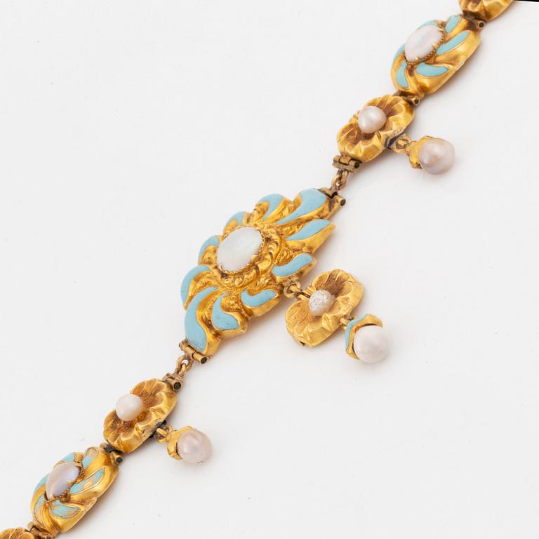 An 18K gold and enamel necklace set with pearls and half pearls.
