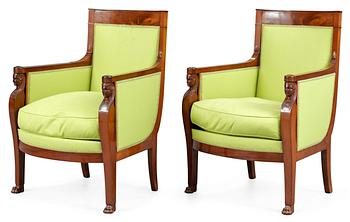A pair of French Empire early 19th century bergeres.