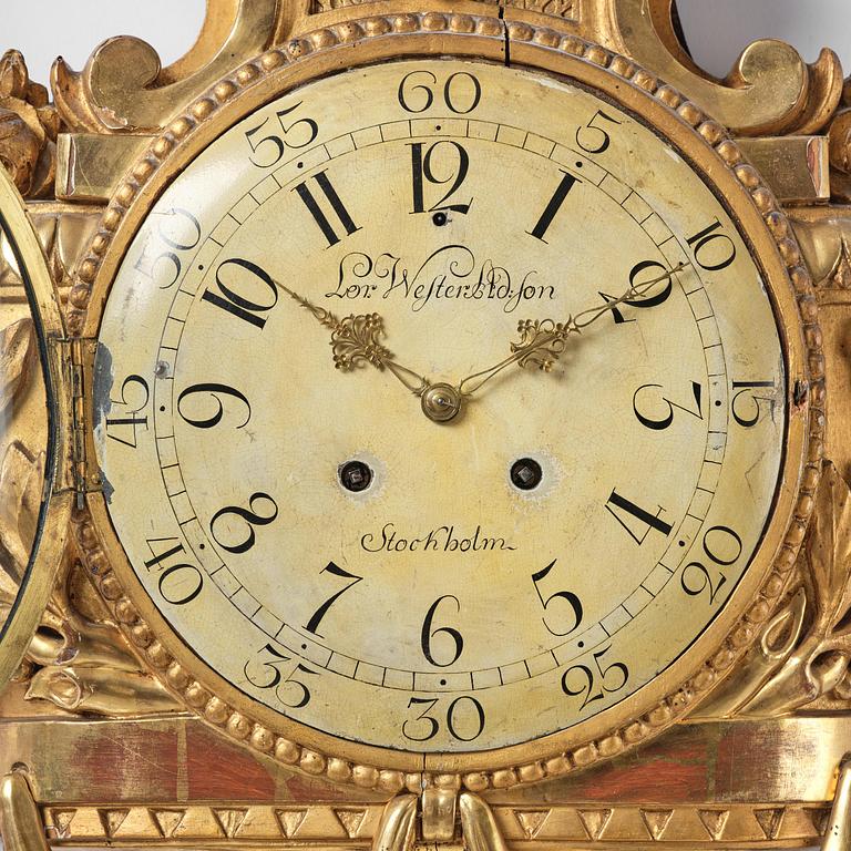 A Gustavian giltwood cartel clock by L. Adamson Wester (watchmaker in Stockholm 1780-95).