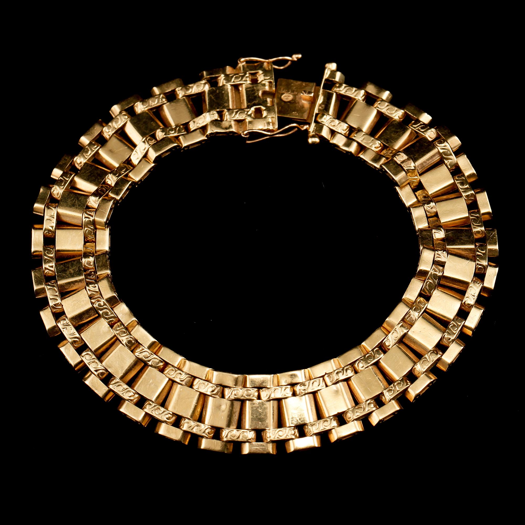 ARMLÄNK, 18k guld, importstämplad. 1900-talets tredje kvartal. Vikt 25 g.