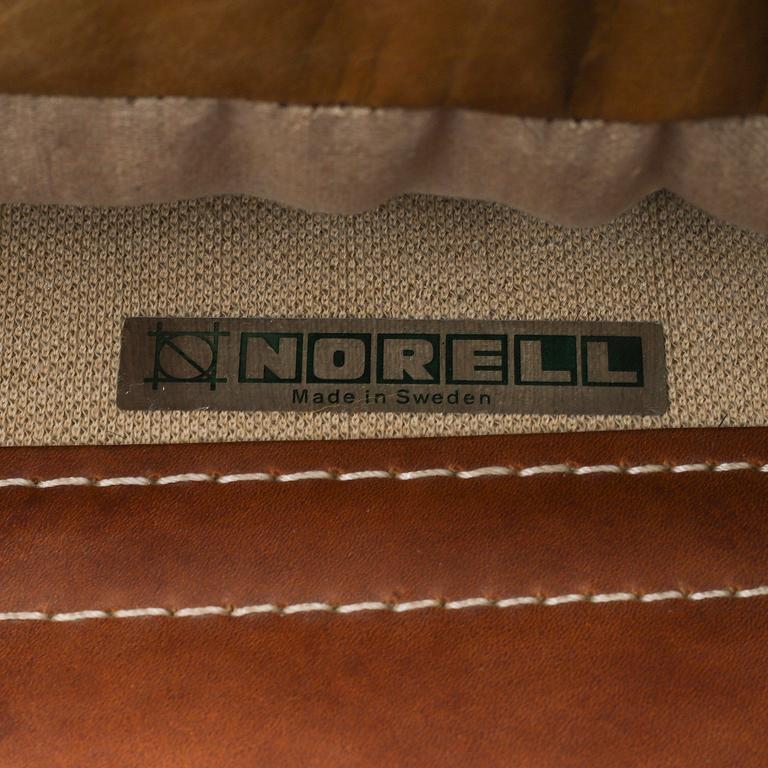 AN ARNE NORELL "INCA" LOUNGE CHAIR.