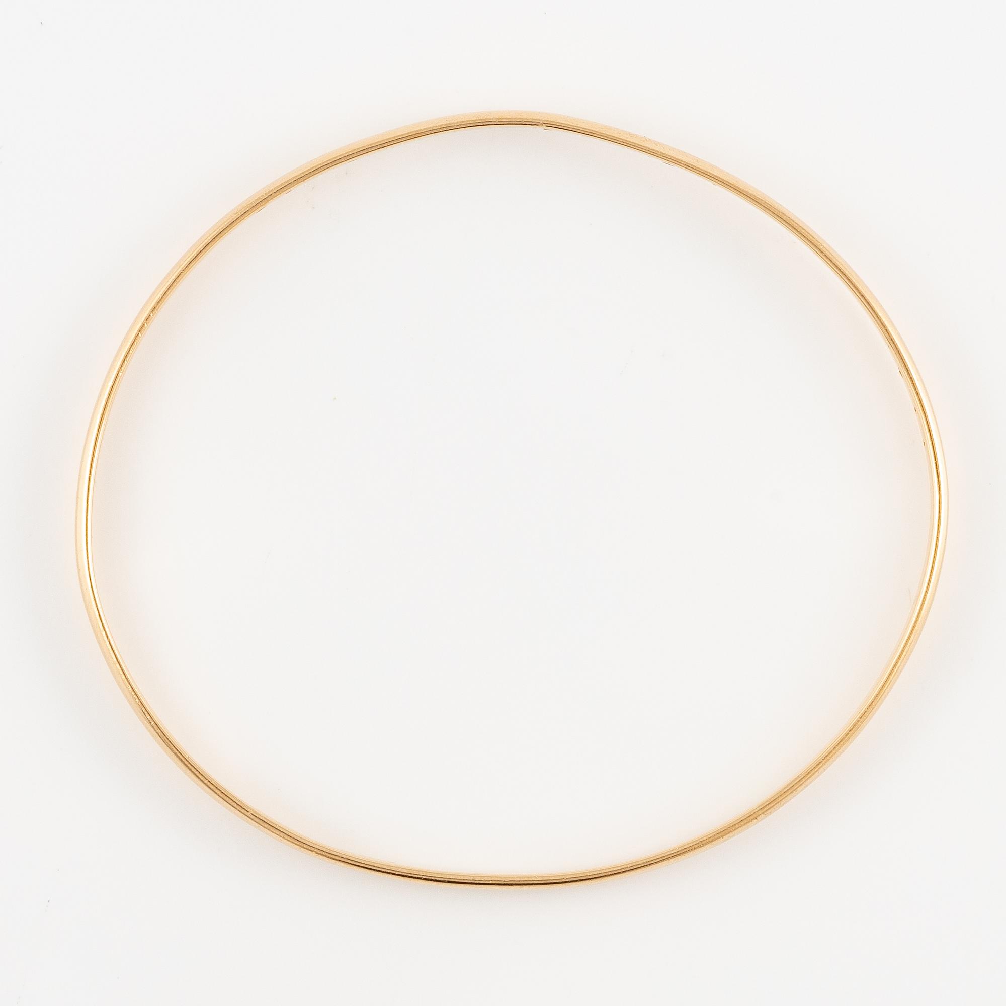Arm ring 18K gold.