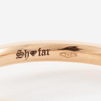 Ring in 18K gold set with brilliant-cut diamonds.