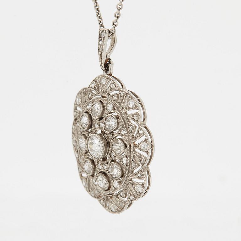 A platinum pendant set with old- and rose-cut diamonds.