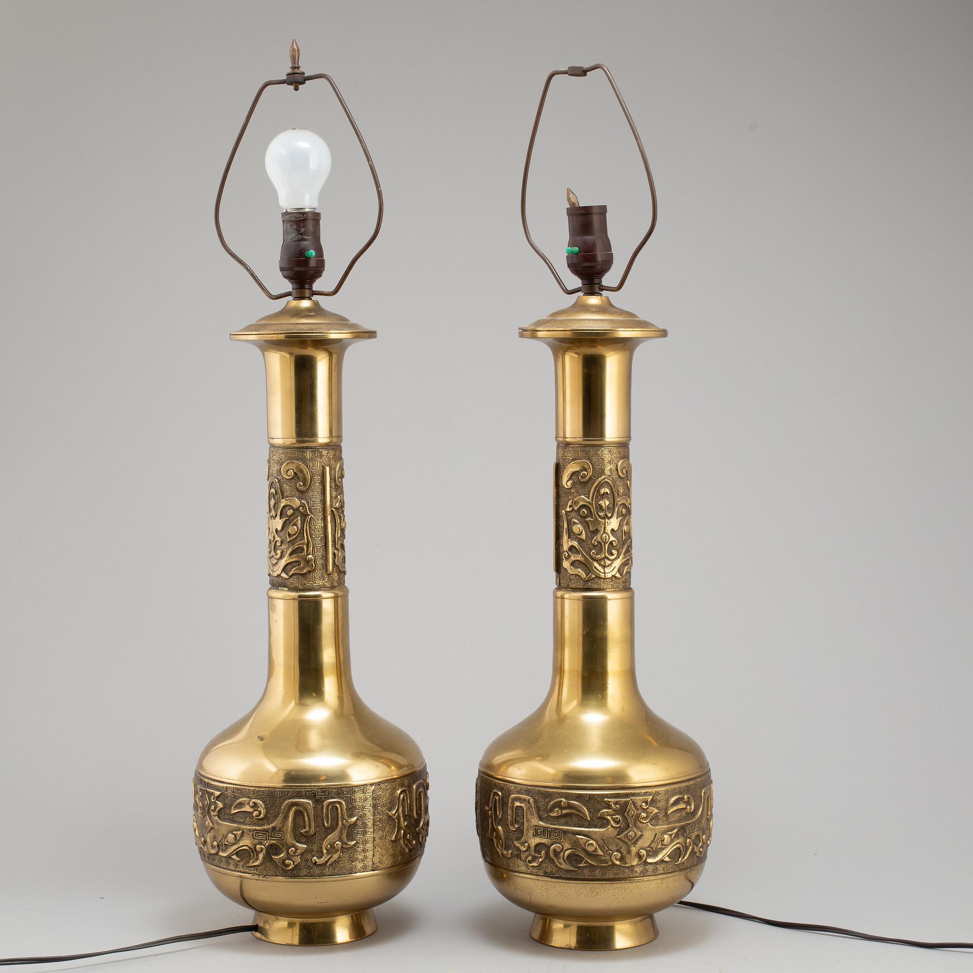 A pair of Chinese brass table lamps, 20th century.