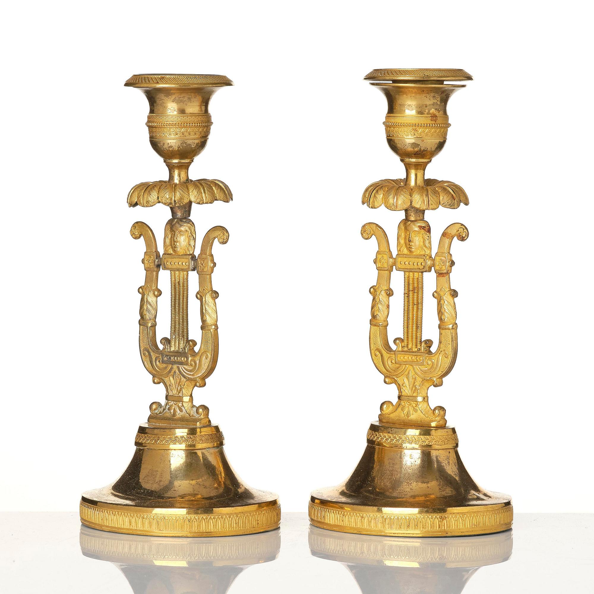 A pair of Swedish Empire ormula candlesticks.