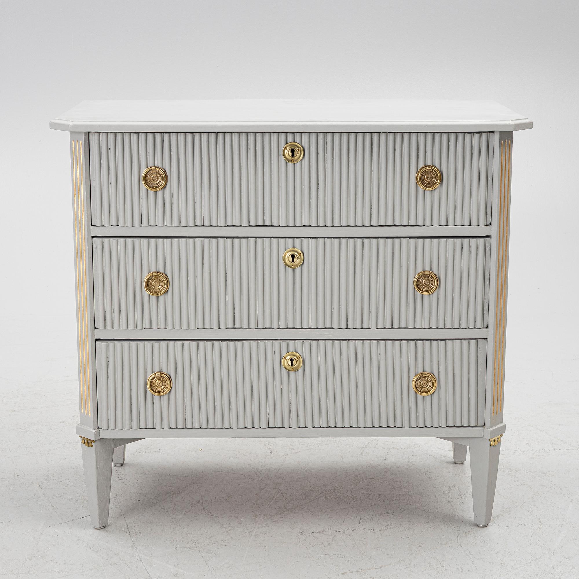 A Gustavian style chest of drawers, mid-20th century.