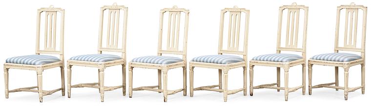 A set of five Gustavian late 18th Century chairs. Comprising one copy.