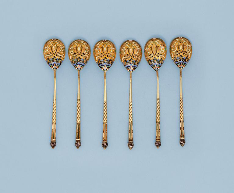 A SET OF SIX RUSSIAN SILVER-GILT AND ENAMEL TEA-SPOONS, Makers mark of 11th Artel, Moscow early 20th century.