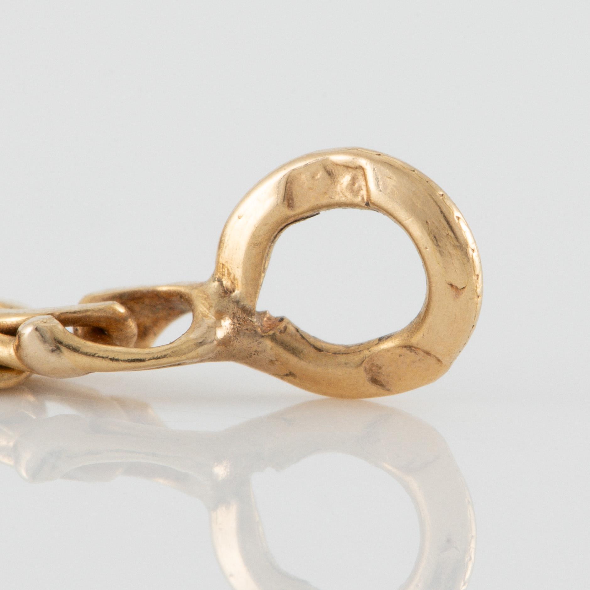 Pocket watch, 14K gold with chain, 32 mm.