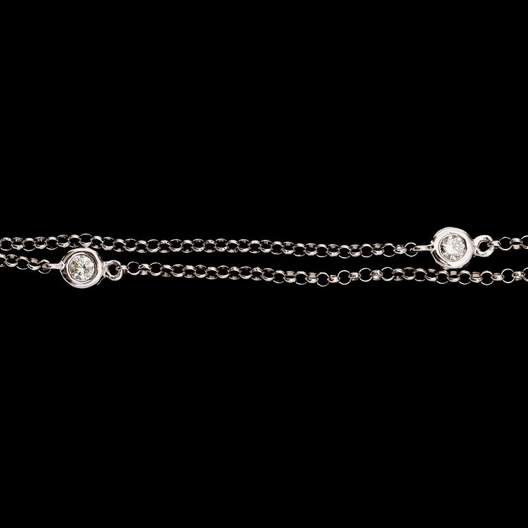 COLLIER, 18 k vitguld, smaragd ca 1.86 ct, briljantslipade diamanter tot ca 0.94 ct.