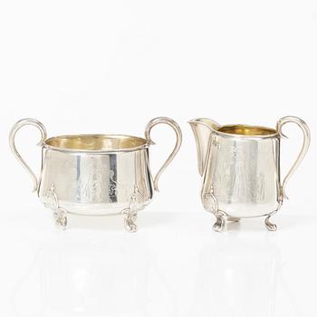 A Danish silver sugar bowl and cream jug.