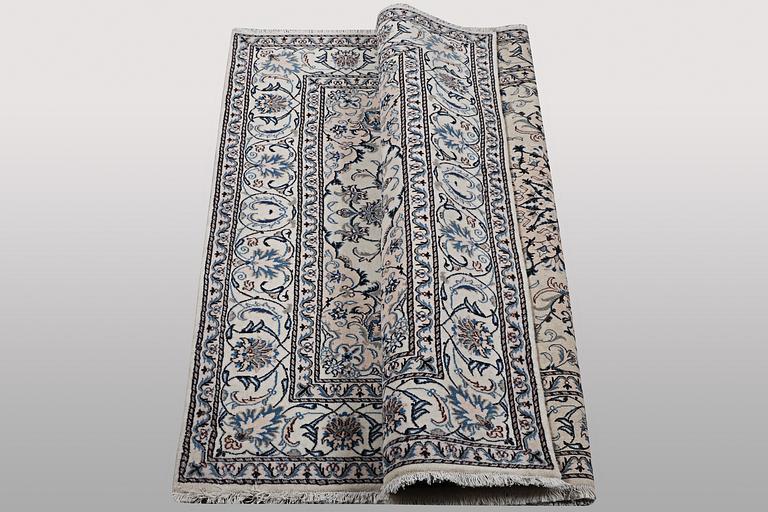 A rug, Nain, part silk, ca 200 x 195 cm.