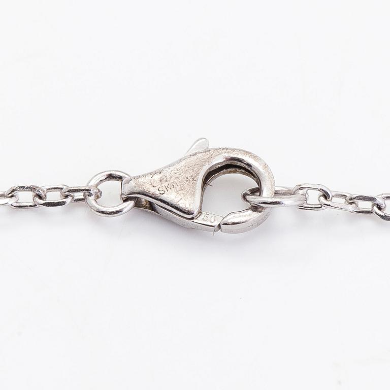 Cartier, an 18K white gold 'C Heart of Cartier' necklace with diamonds approx. 0.09 ct in total.