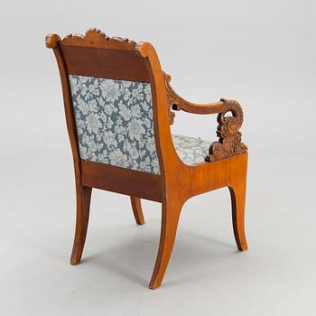 A pair of mid-19th century late Empire Russian open armchair.